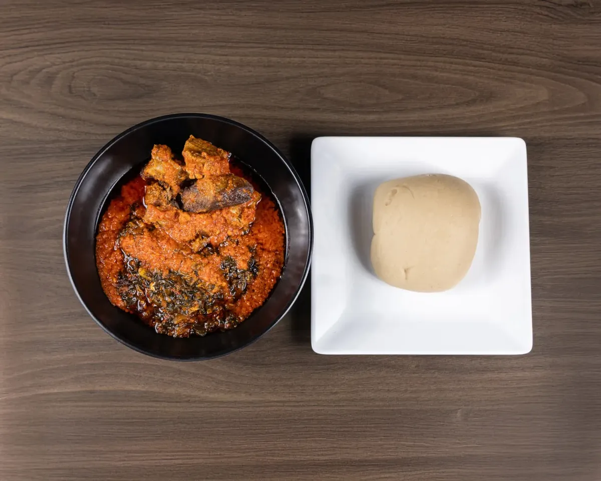 Rich red soup served with swallow at M&M African Kitchen & Bar